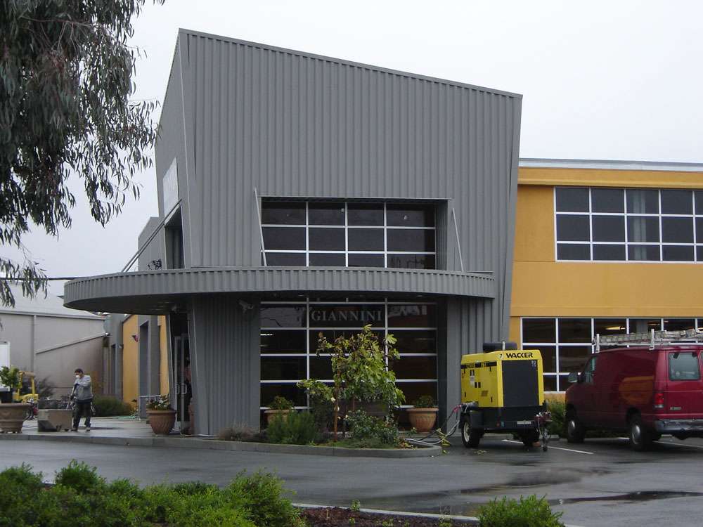 gray-building-metal Steel siding and steel roofing used for an architectural accent on this gray building