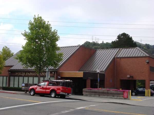 Replacement standing seam metal roof on a commercial building