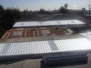 Metal Roof Replacement in Progress