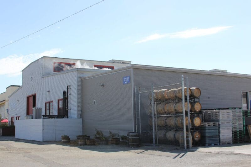 Alameda Point Corner metal building erected with wine barrels stored